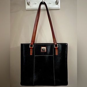 * Dooney and Bourke long-lasting pebble leather tote. Like-new. Only used once.